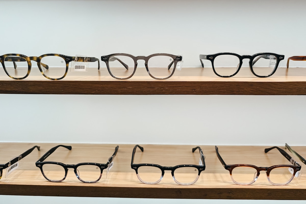 Multiple designer eyeglass frames arranged on surface